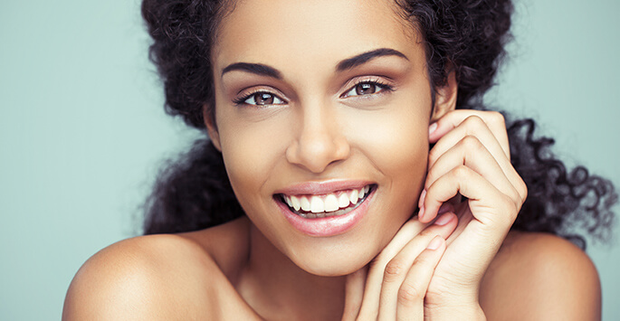 beautiful woman with flawless skin at amachi medspa